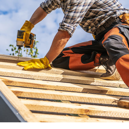 DIY RentalsYellow power drill being used on a roof by a contractor